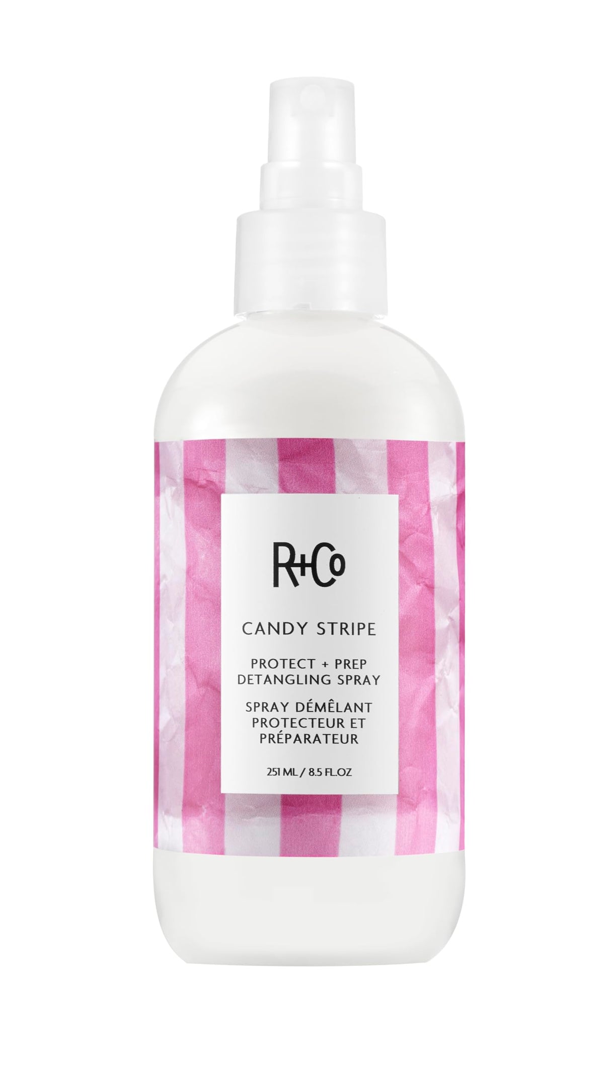 R+Co Candy Stripe Protect + Prep bottle ready for quick detangling and protection.