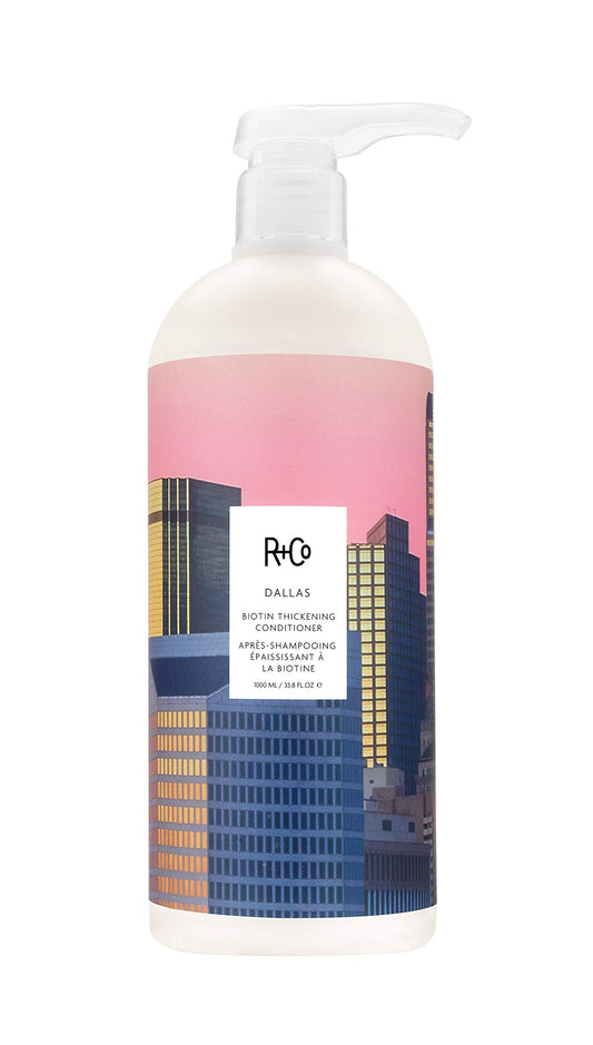 R+Co Dallas Biotin Thickening Conditioner front view enhances body and shine.