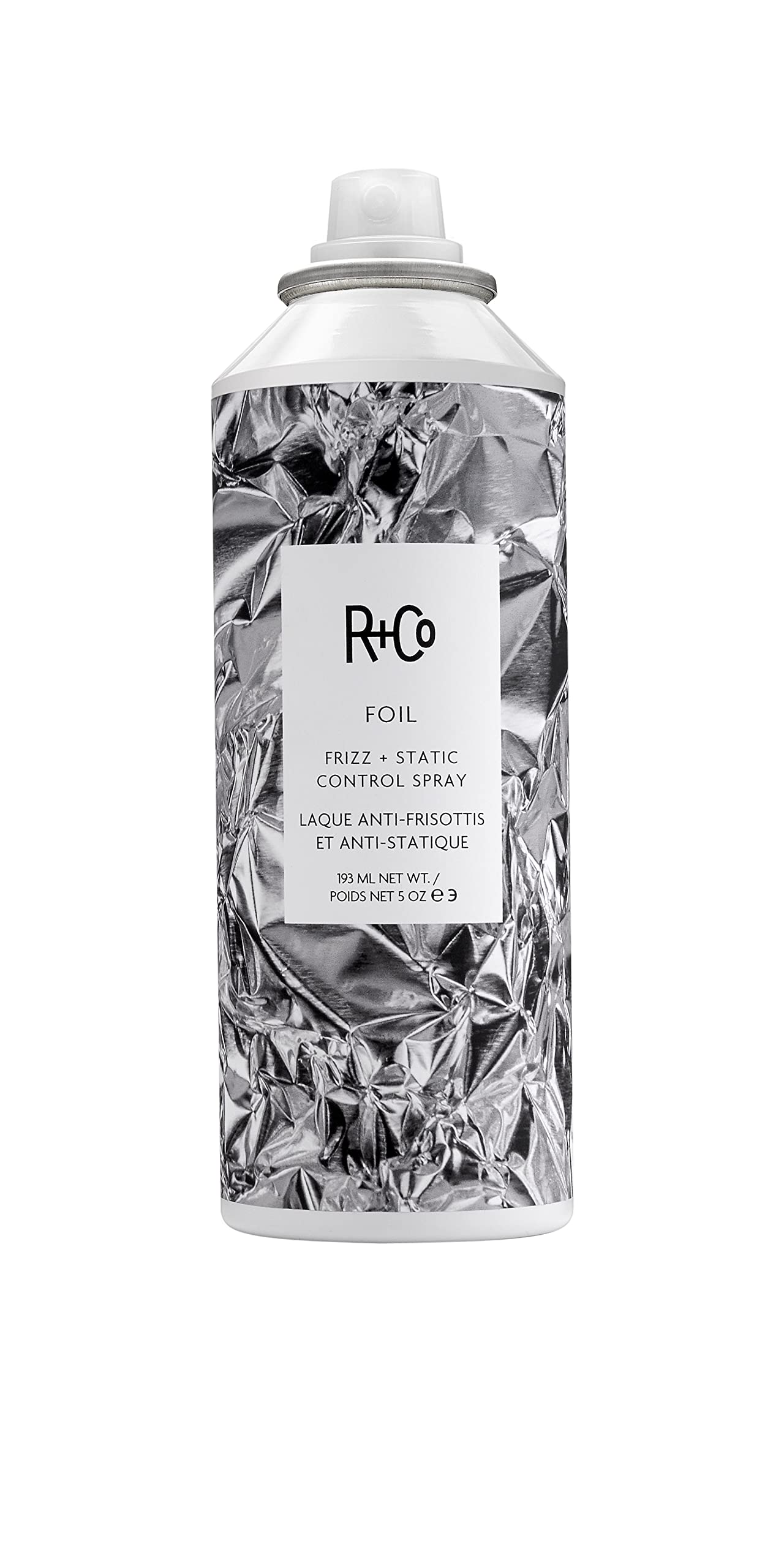 R+Co Foil Frizz + Static Control Spray bottle delivers sleek, frizz-free shine.