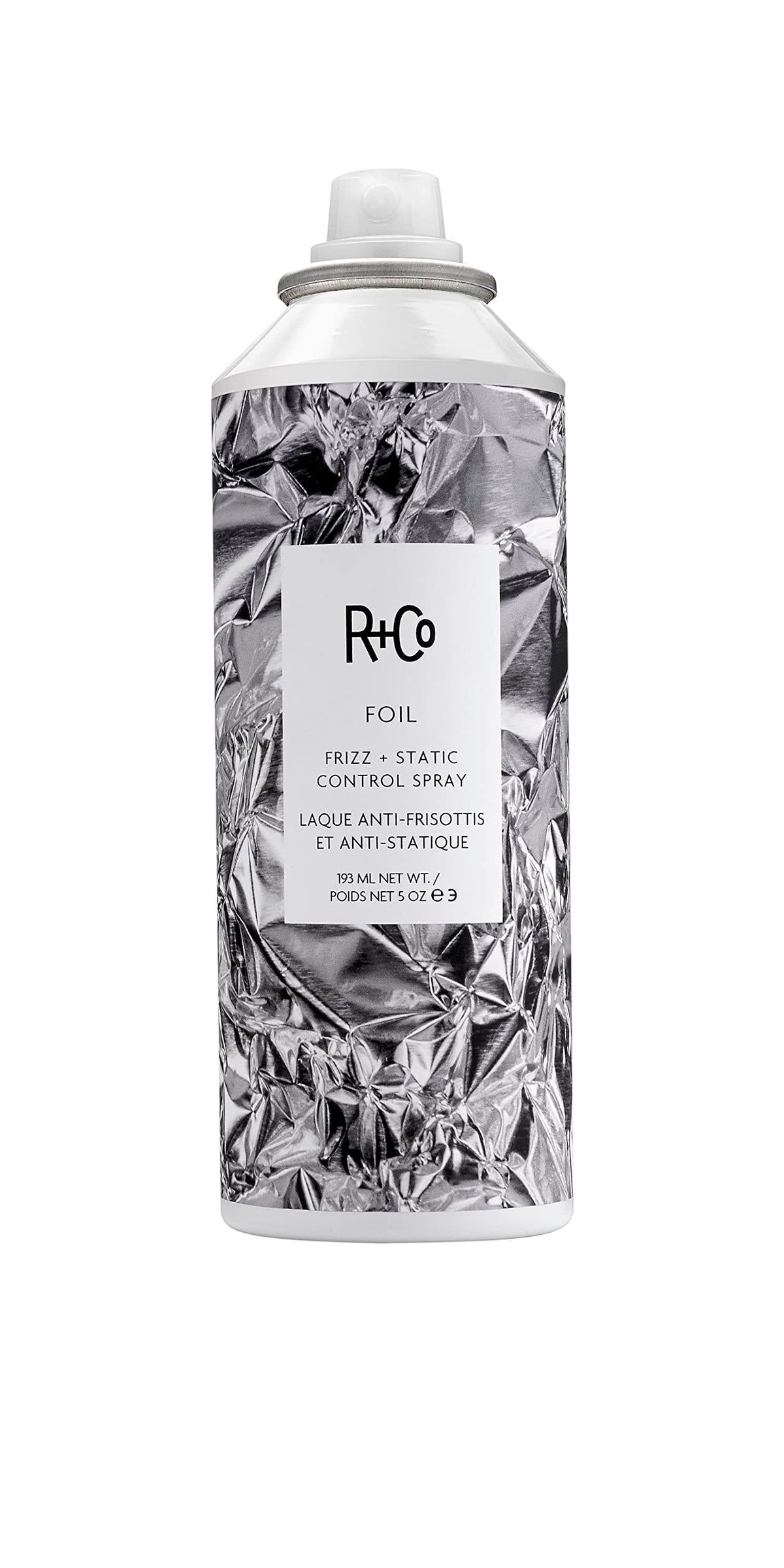 R+Co Foil Frizz + Static Control Spray bottle delivers sleek, frizz-free shine.