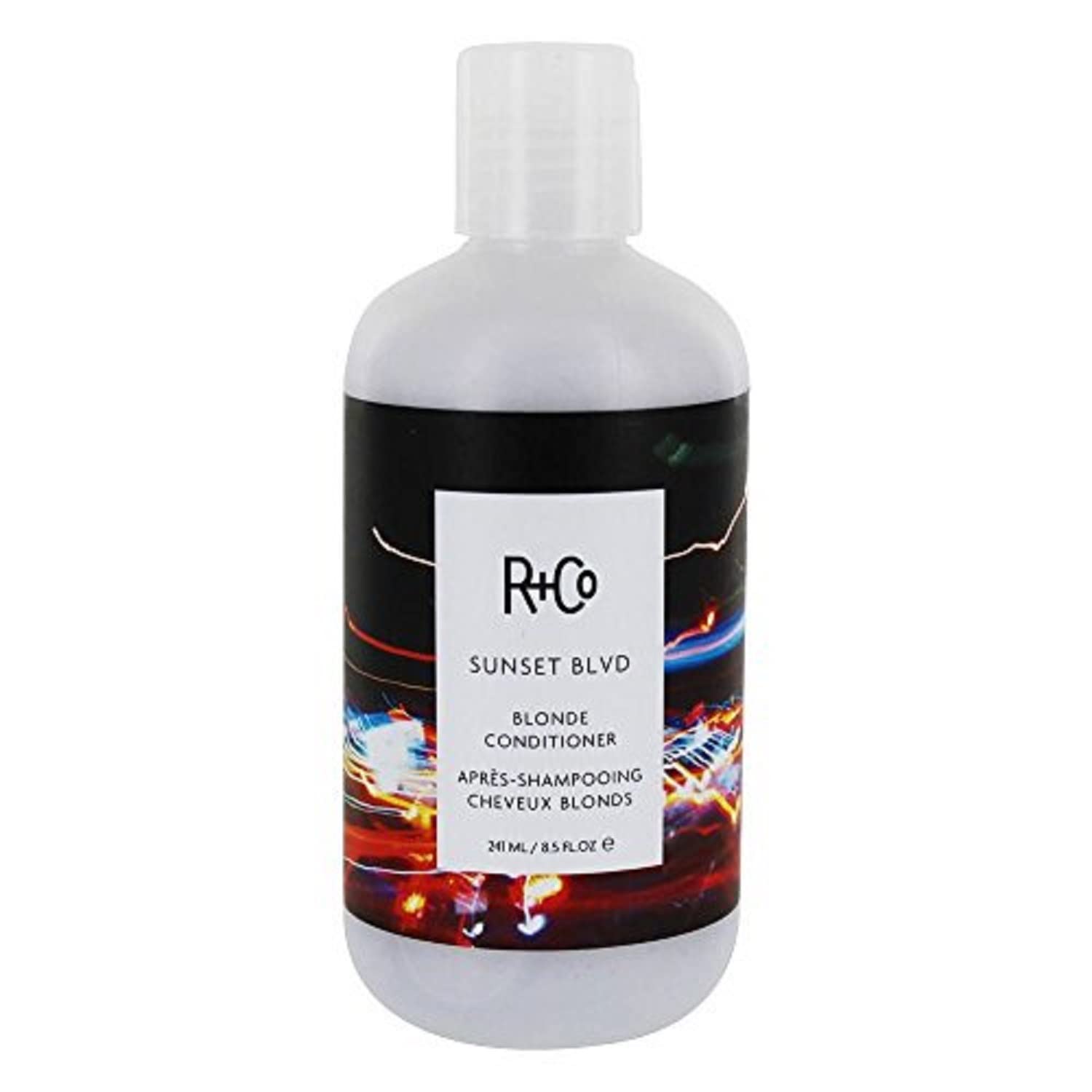 R+Co Sunset Blvd Conditioner bottle with pump, ready for daily brightening.