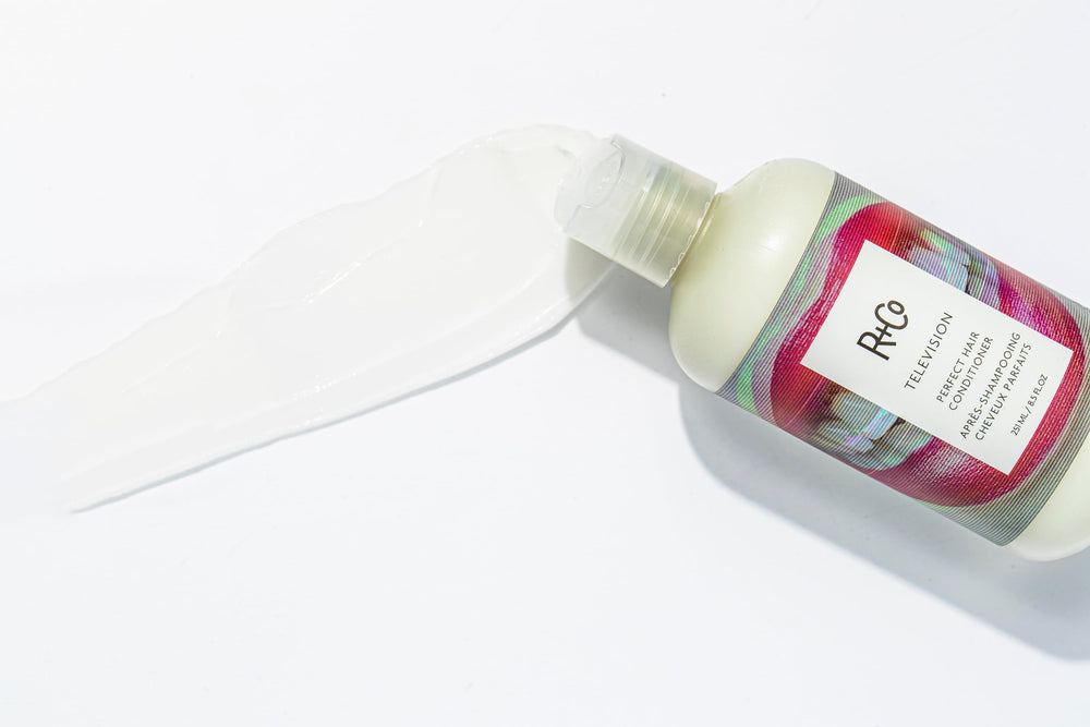 R+Co Television Perfect Hair Conditioner creamy texture spreading evenly through hair