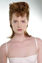 R+Co VICIOUS close-up shows hydration from Provitamin B5 for healthy shine.