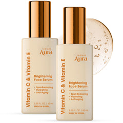 Radiant Aura Vitamin C & E serum bottle close-up showing glow-friendly formula