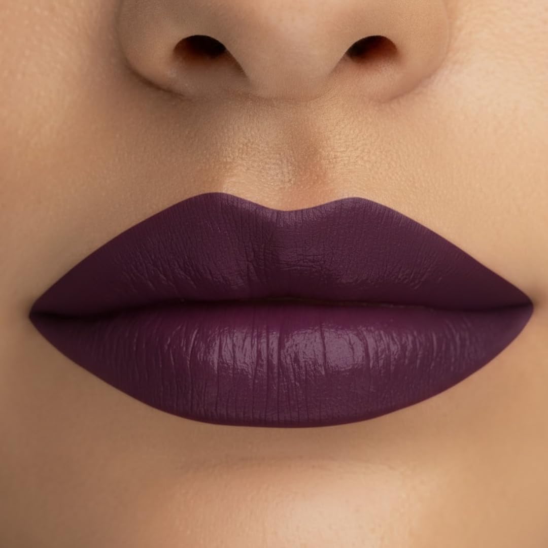 Radiant Professional Advanced Care Lipstick in ripe plum swirl enhances lips with depth