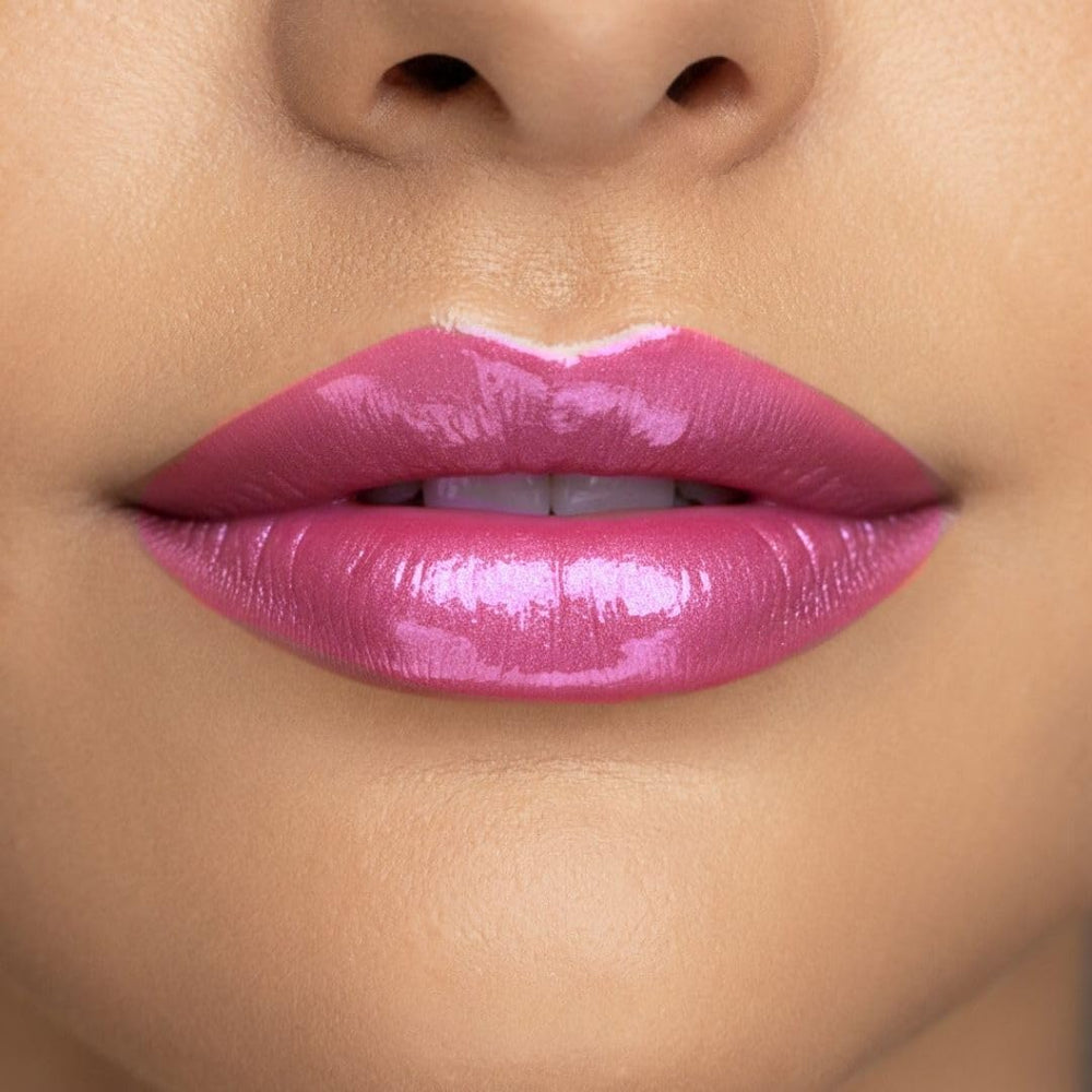 Radiant Professional Lip Glaze sponge applicator ready for smooth application
