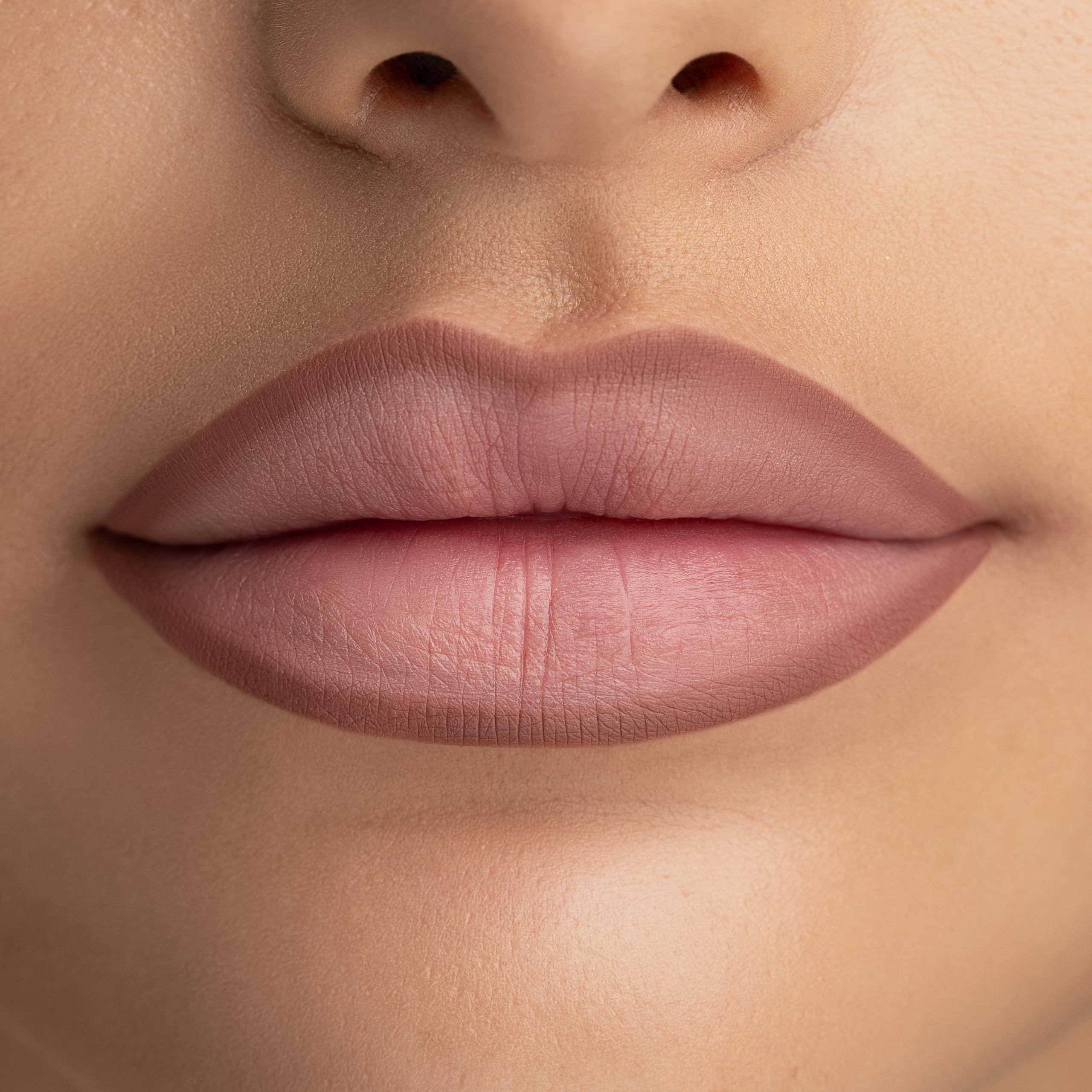 Radiant Professional Hellenica Softline lip liner in use outlining lips for a crisp edge.