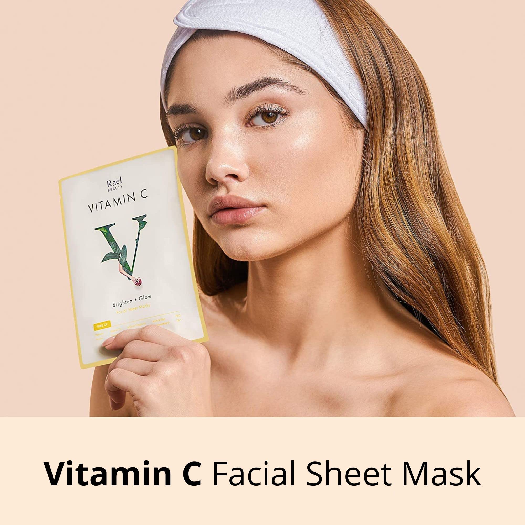 Rael Vitamin C glow on model with dewy skin.