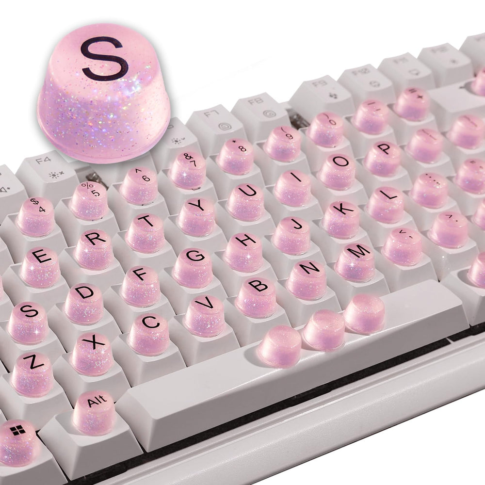 Raised Button pink bling keycaps for 64 keys improve grip during typing.