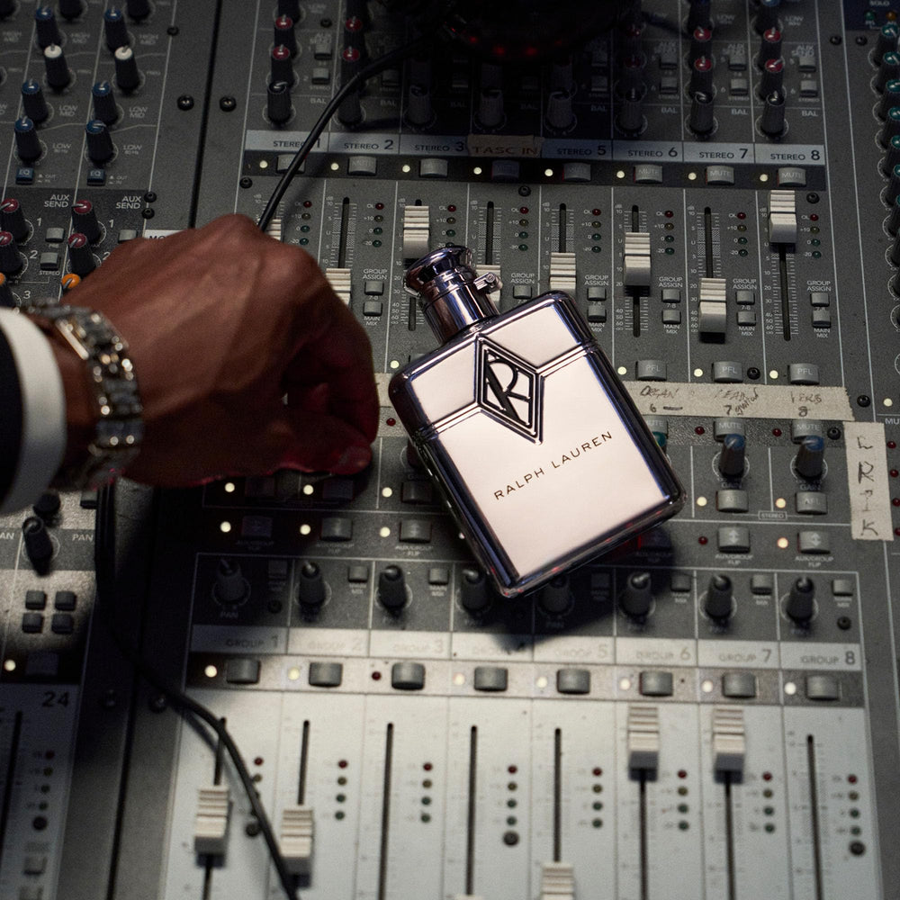Applying Ralph Lauren Ralph's Club New York to pulse points for lasting aroma.