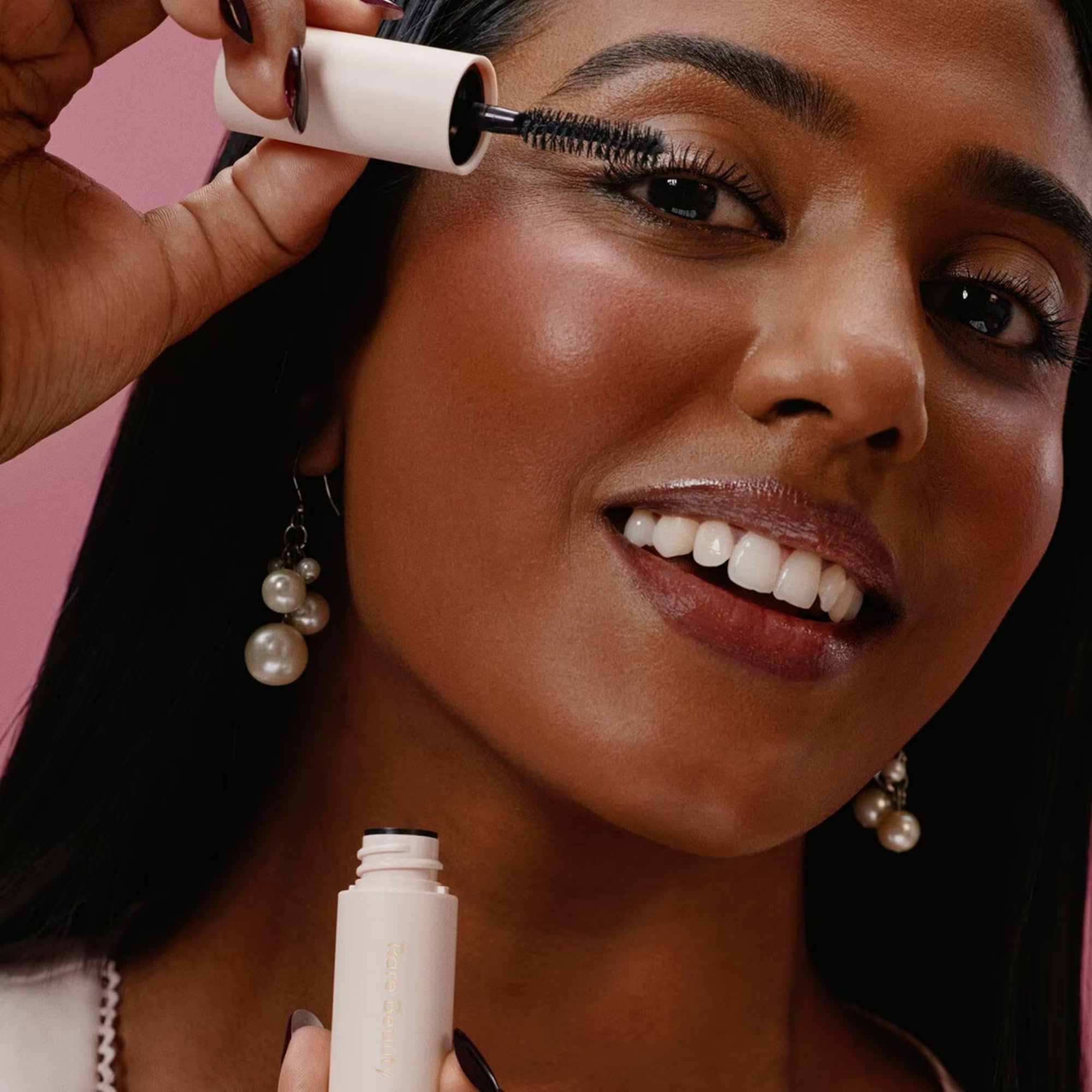 Rare Beauty perfect-strokes-mini-mascara closeup shows smooth, clump-free lashes.