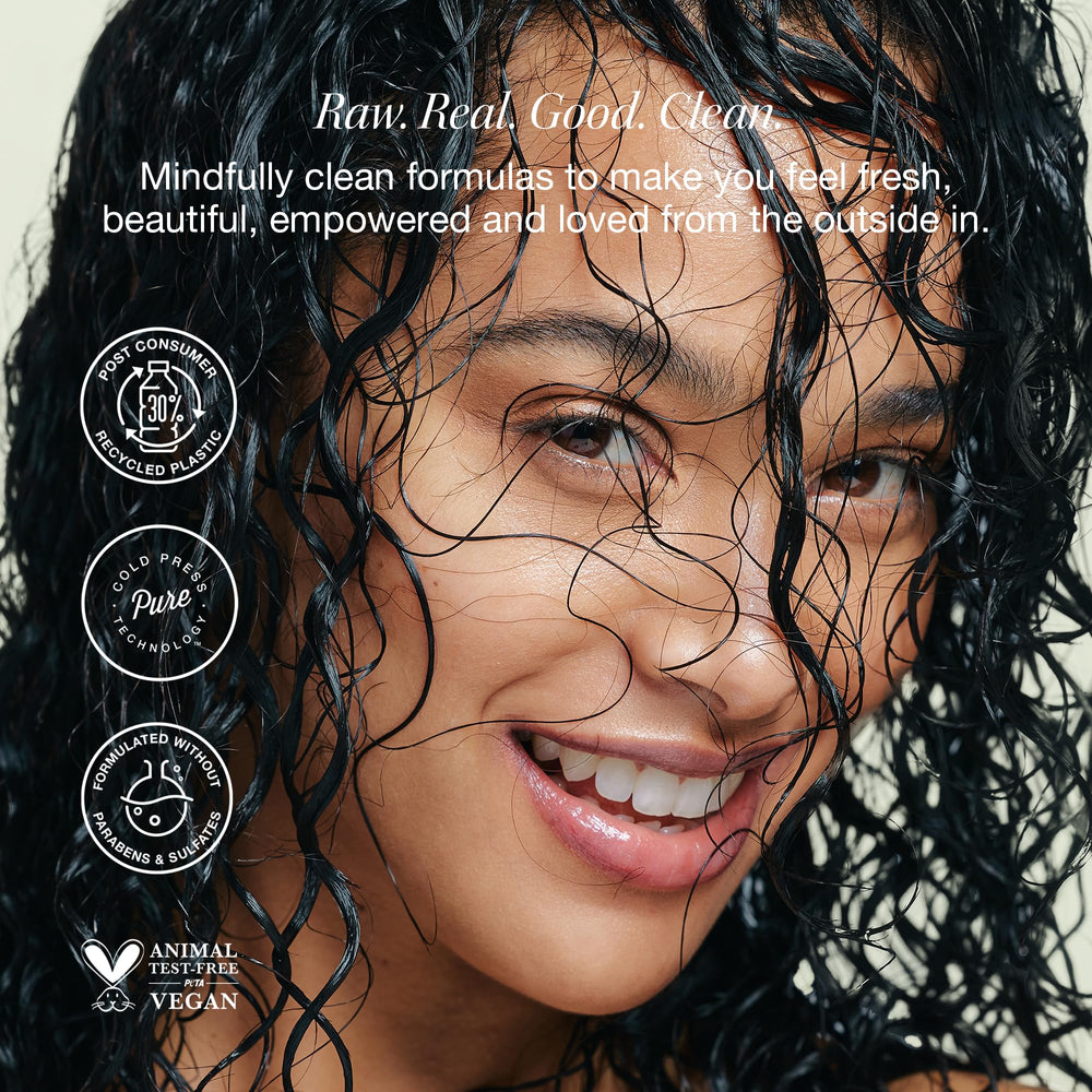 Applying Raw Sugar Moisture Smoothie Mask for intense hydration and repair.