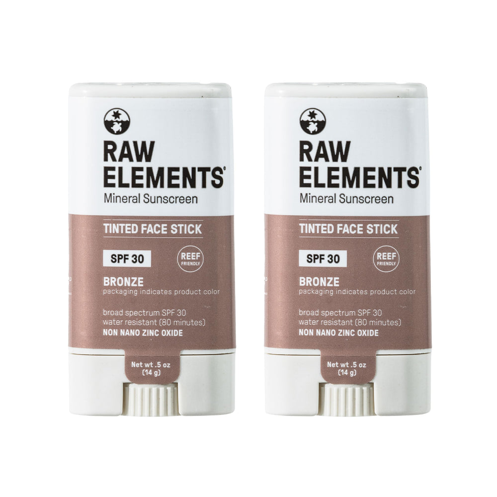 Raw Elements bronze-tinted face cream SPF 30 on skin for daily sun protection.