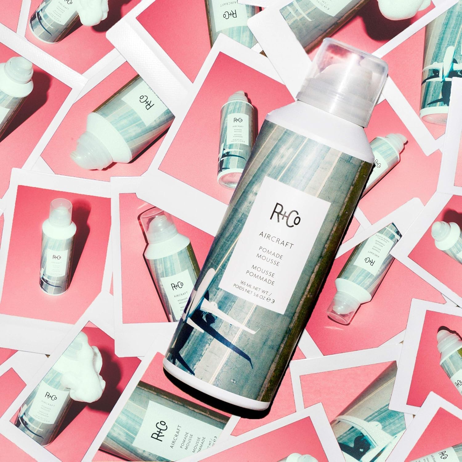 R+CO Aircraft Pomade Mousse close-up to define curls beautifully