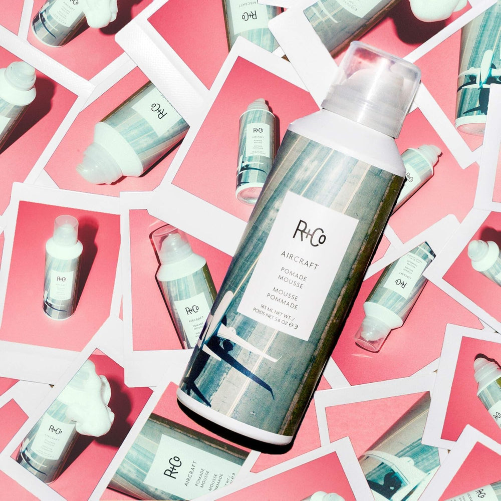 R+CO Aircraft Pomade Mousse close-up to define curls beautifully