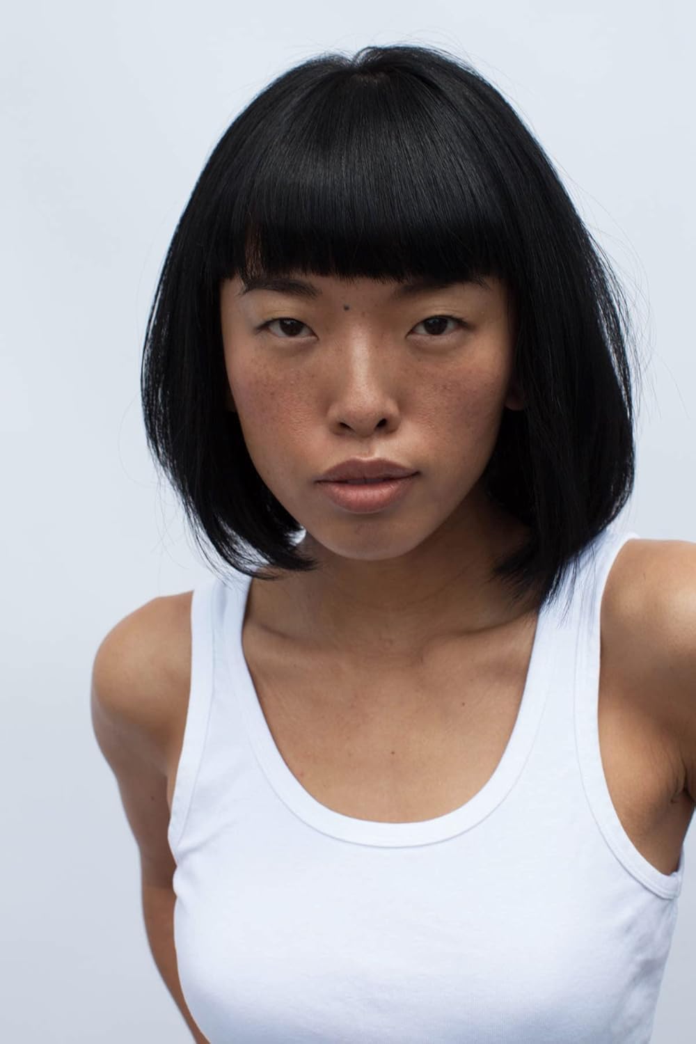R+Co Dallas Biotin Thickening Conditioner model hero shot conveys volume and shine.