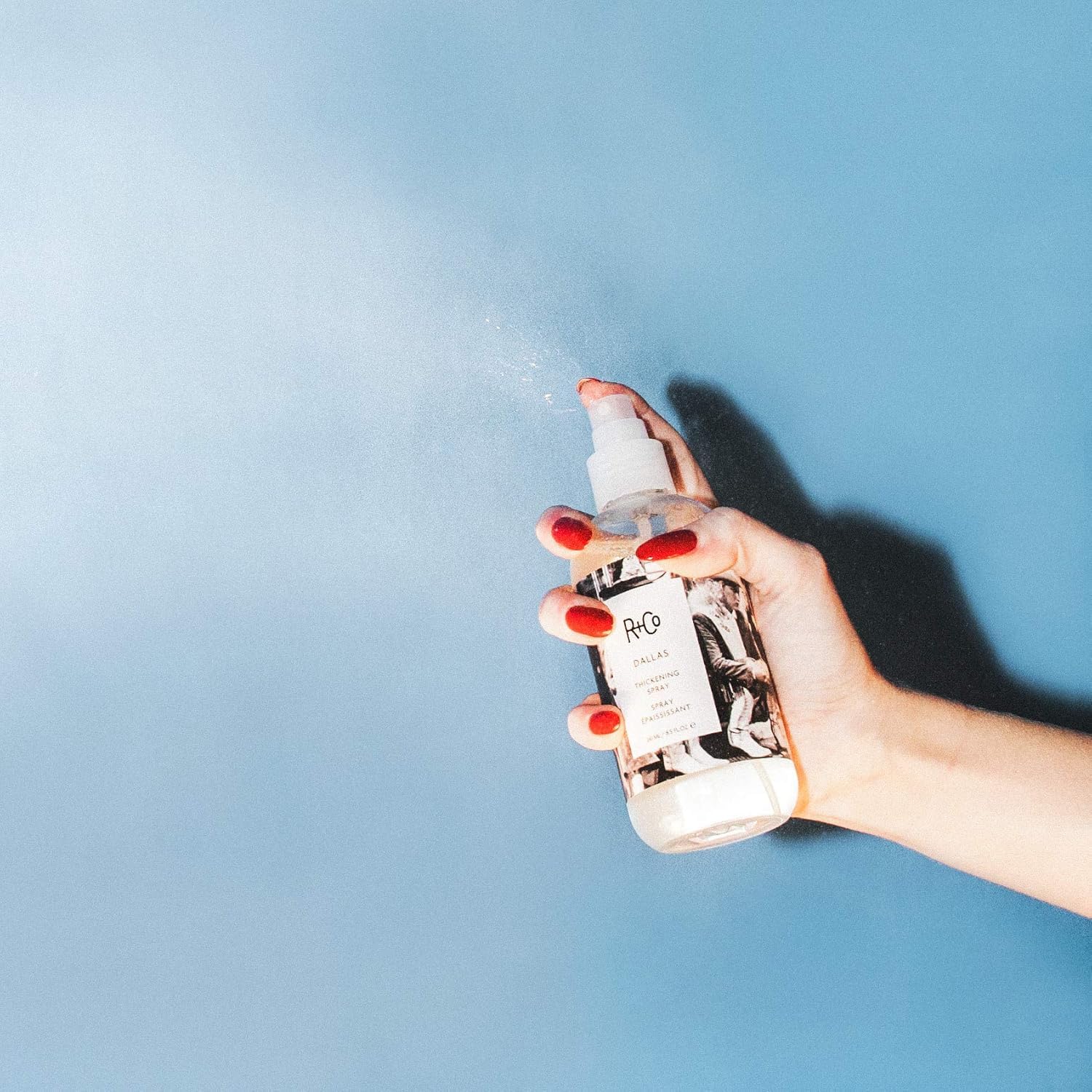 R+Co Dallas provides shine and body for smooth, modern styles.
