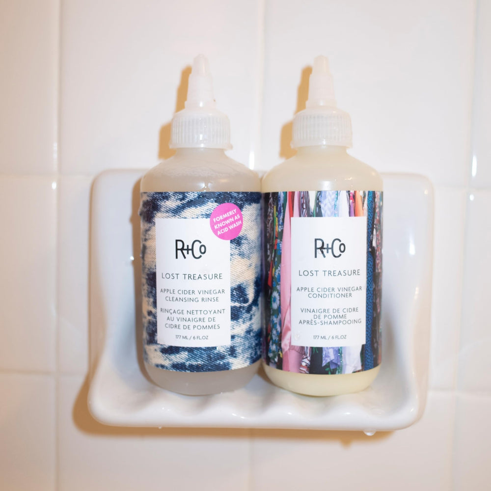 The R+Co Lost Treasure bottle with pump enables easy dispensing.