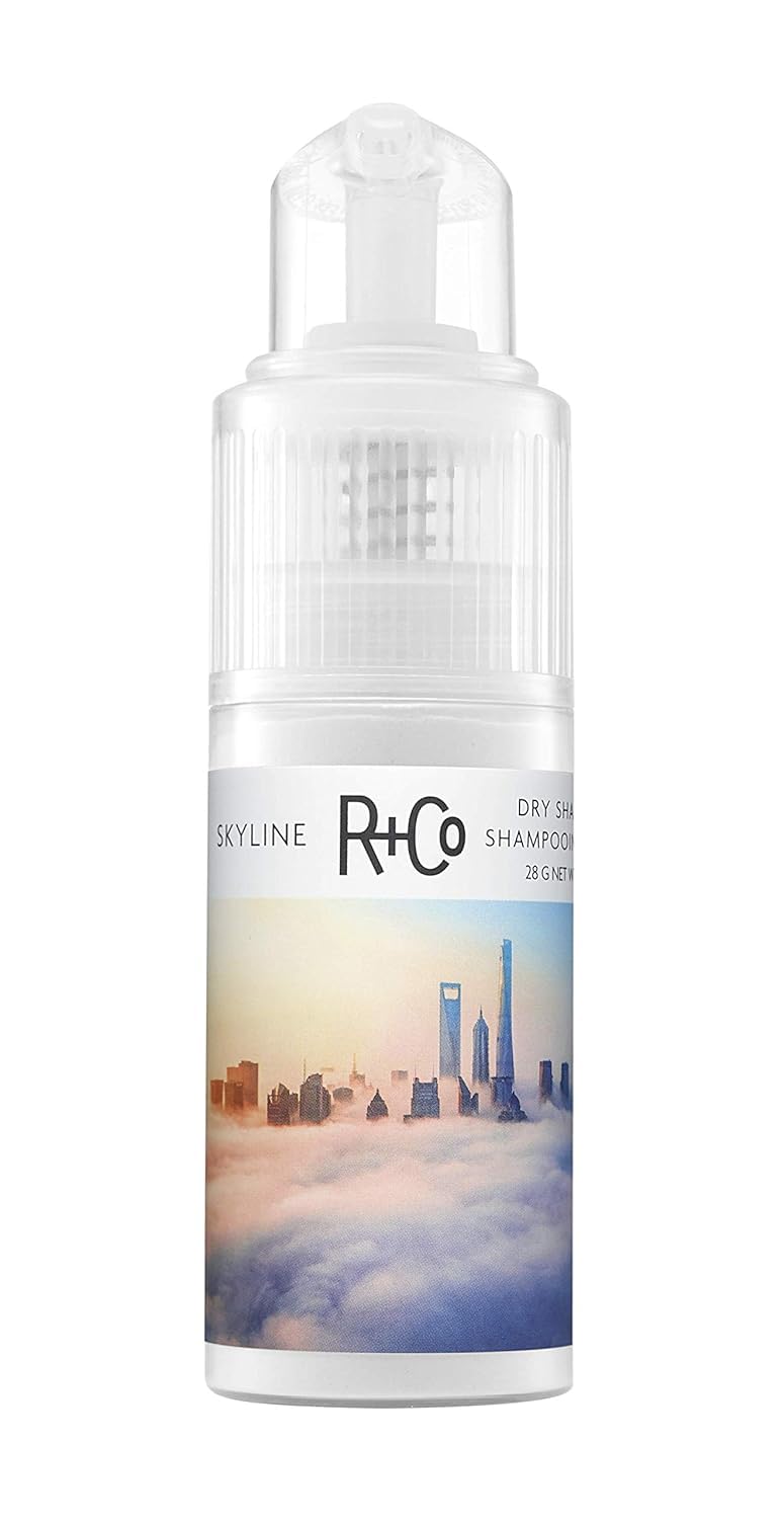 R+Co Skyline dry shampoo powder demonstrates precise application for targeted root refresh