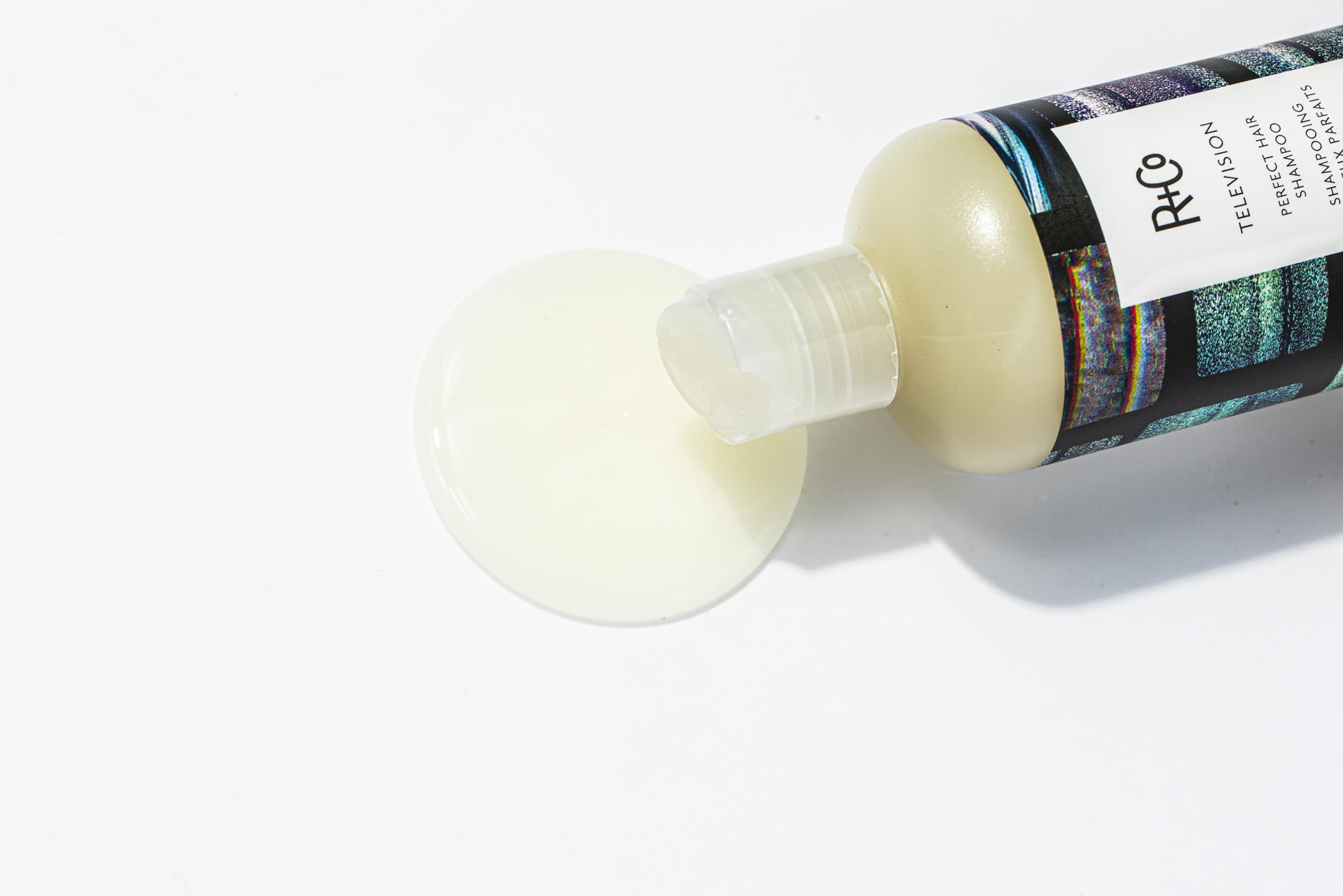 R+Co Television Perfect Hair Shampoo label emphasizes vegan and cruelty-free formula.