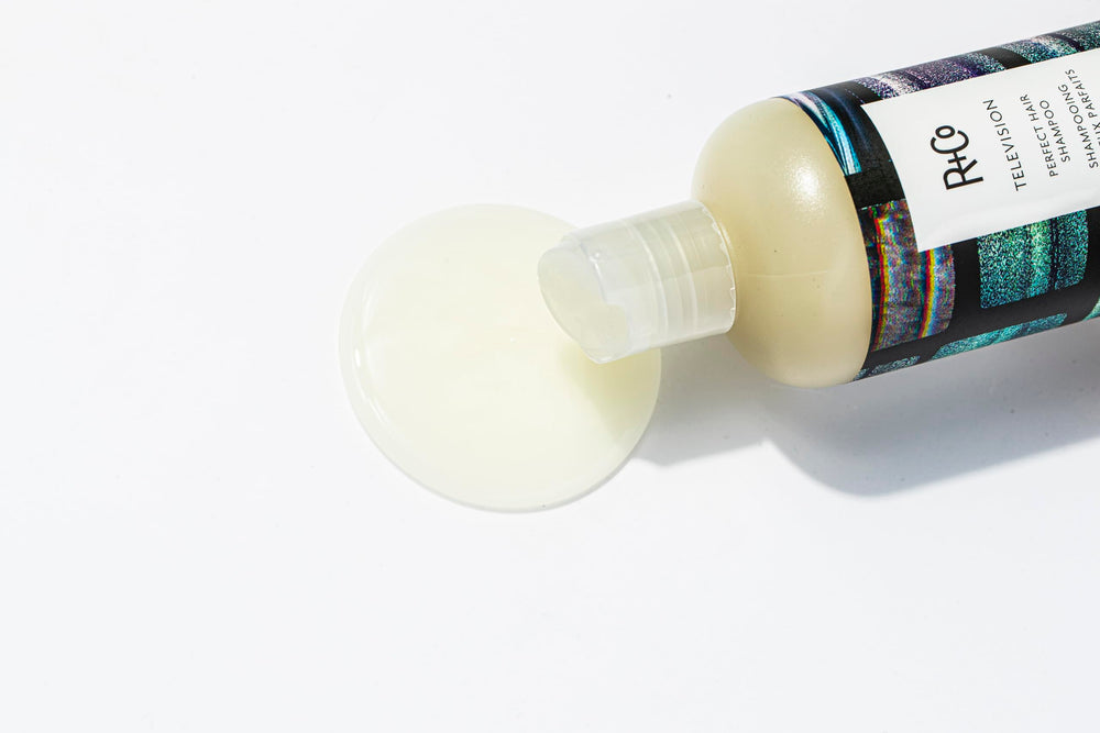 R+Co Television Perfect Hair Shampoo label emphasizes vegan and cruelty-free formula.