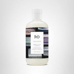 R+Co Television Perfect Hair Shampoo applied for smoother, softer hair.