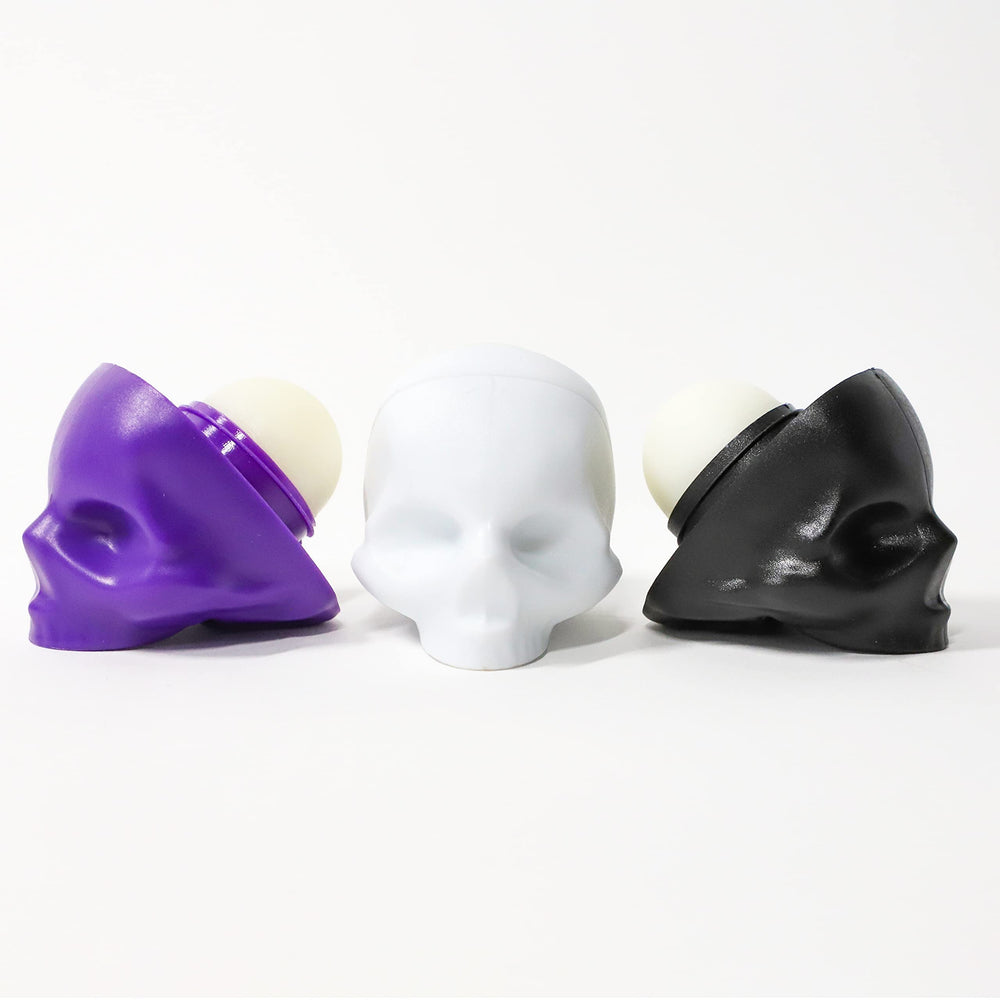 REBELS REFINERY Passion Fruit skull balm tube offers refreshing moisture for lips
