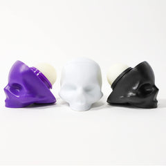 REBELS REFINERY Passion Fruit skull balm tube offers refreshing moisture for lips
