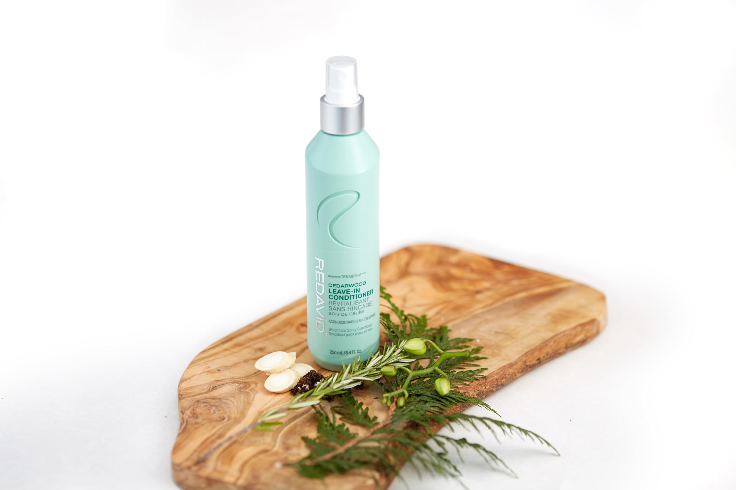 Redavid Cedarwood Leave-In Hand Application for easy misting and styling.
