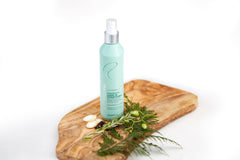Redavid Cedarwood Leave-In Hand Application for easy misting and styling.