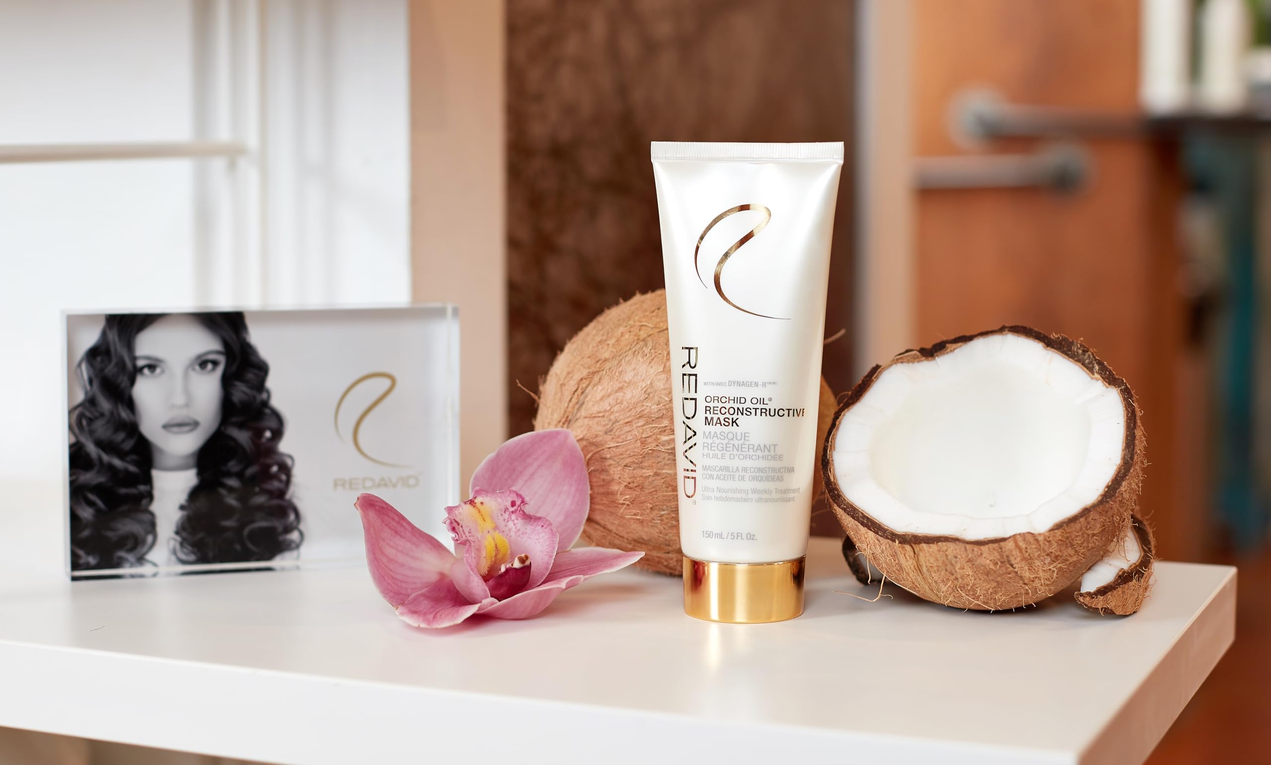 Redavid Orchid Oil ingredients close-up showing argan, shea, and keratin nourishing hair.