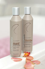 Creamy texture of Redavid conditioner ready to revitalize damaged hair.