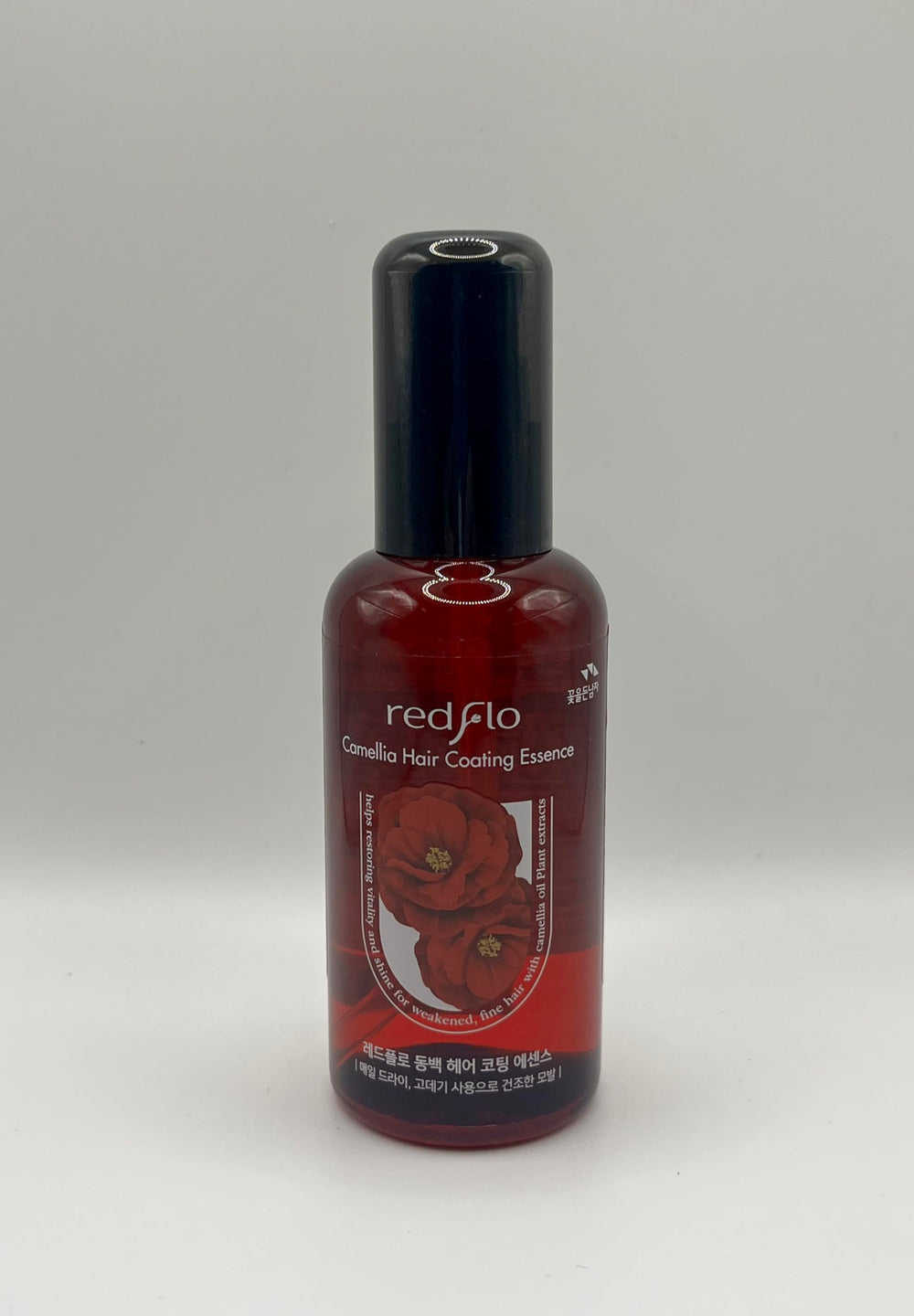 Redflo Camellia Essence ready to apply on hair for smoother strands