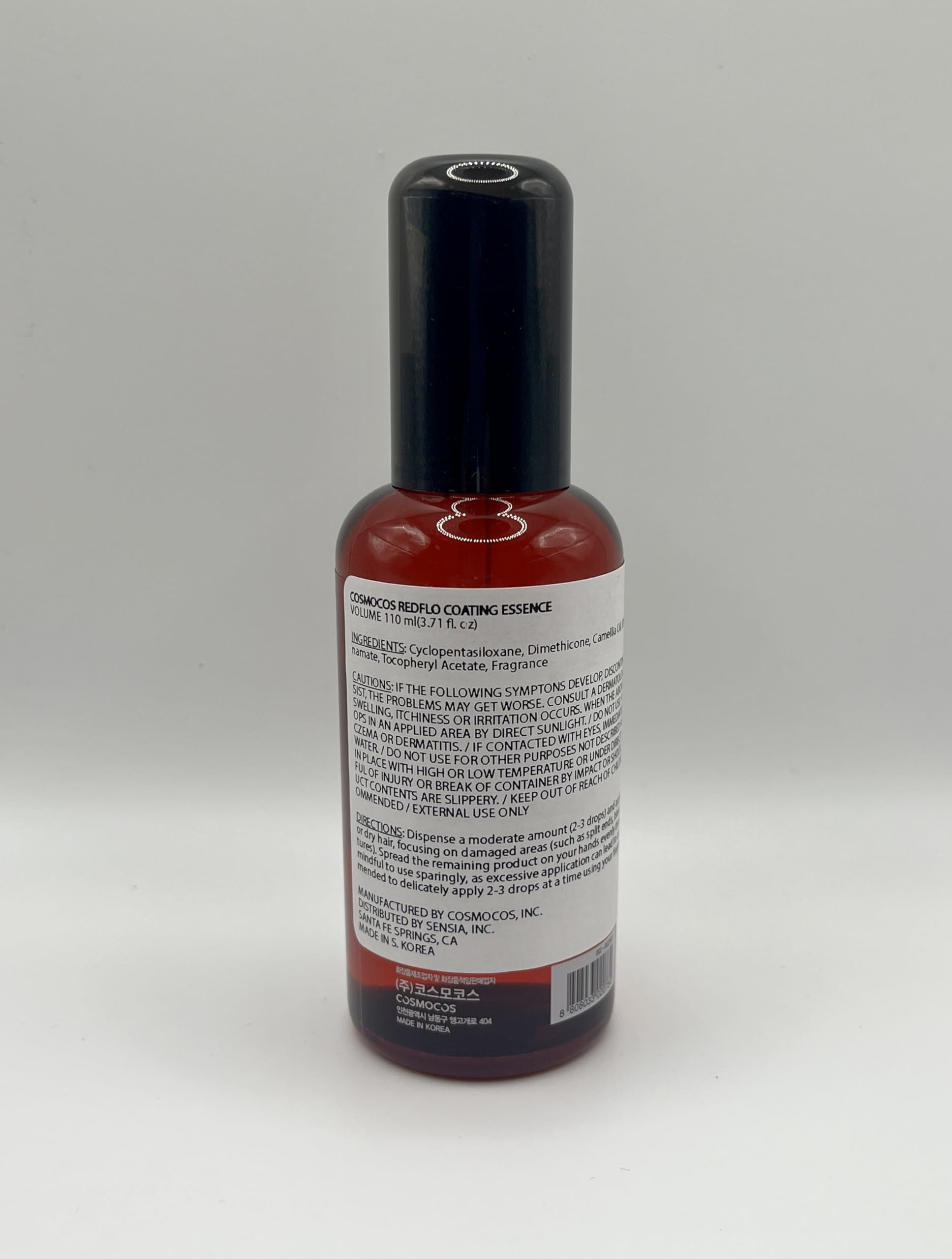 Redflo Camellia Essence coats the cuticle for smoother hair