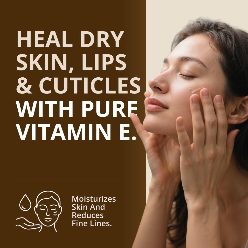 RejuveNaturals Vitamin E Oil full-size bottle with dropper for daily use.