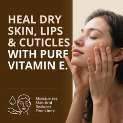RejuveNaturals Vitamin E Oil full-size bottle with dropper for daily use.