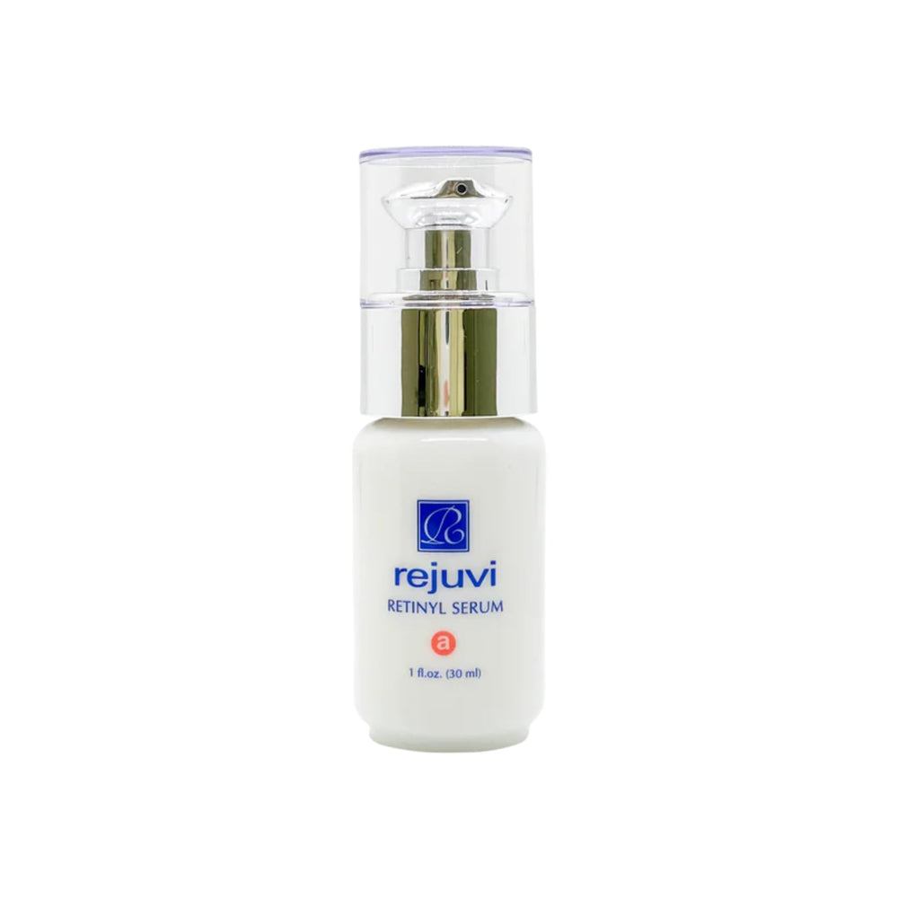 Rejuvi Retinyl Serum bottle close-up for a premium nighttime skincare ritual.