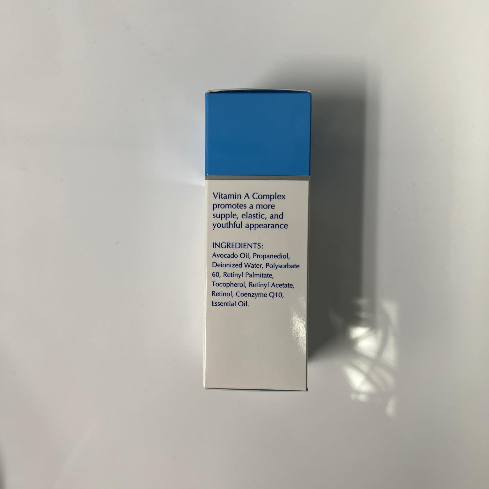 Face application of Rejuvi Retinyl Serum for smoother texture.
