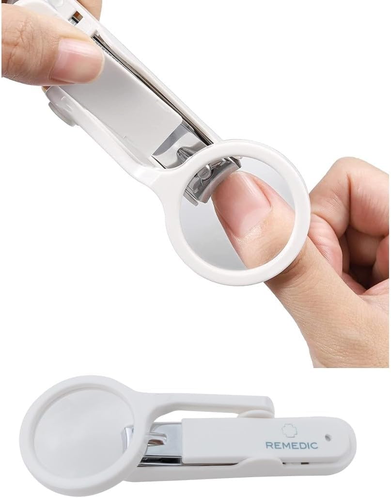 Remedic extra-large nail clippers with magnifier, close-up of sharp carbon steel blades for precise trimming.