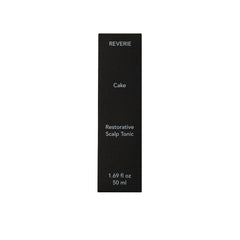 Label on REVERIE Cake Restorative Scalp Tonic showing clean formula