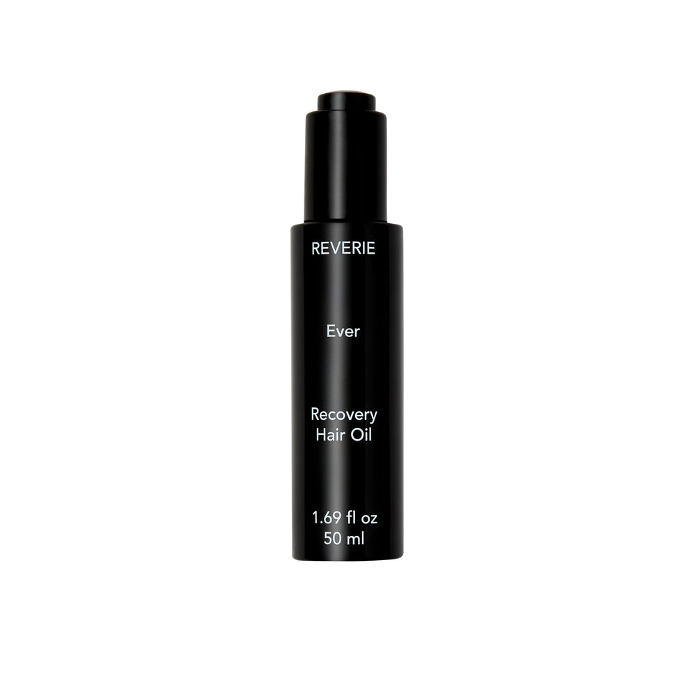 REVERIE Ever Recovery Hair Oil bottle shows a satin shine and luxurious texture.
