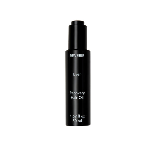 REVERIE Ever Recovery Hair Oil bottle shows a satin shine and luxurious texture.