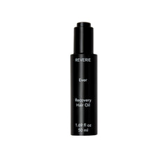 REVERIE Ever Recovery Hair Oil bottle shows a satin shine and luxurious texture.