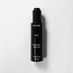 REVERIE Ever Recovery Oil on damp hair promotes a silky shine without heaviness.