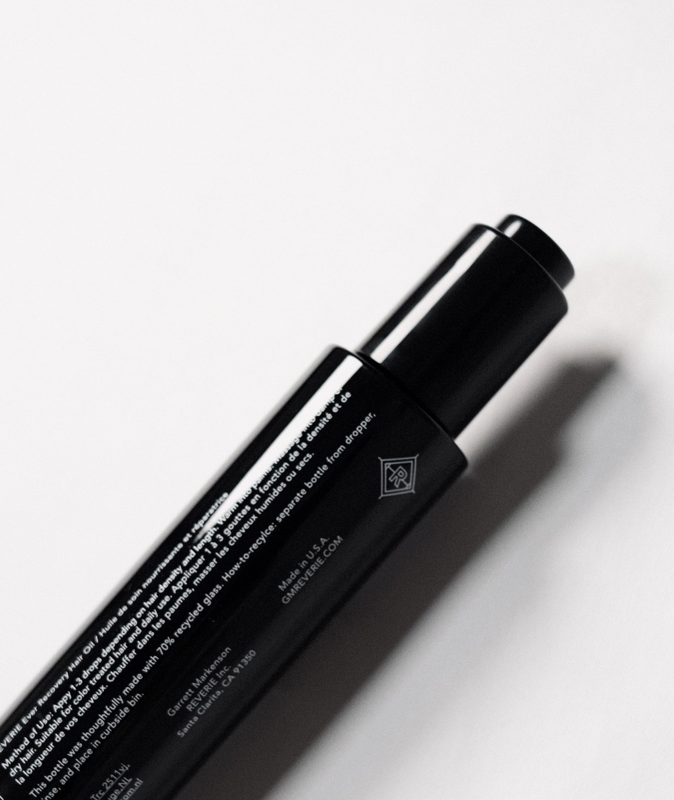 REVERIE Ever Recovery Oil after styling suggests enhanced shine and manageable hair.