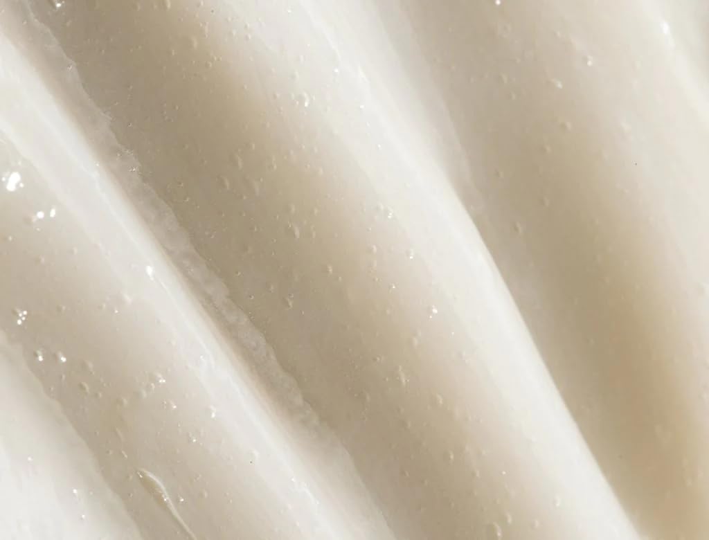 REVERIE Natural Milk Anti-Frizz Leave-In pump-dispense for easy application and hydration