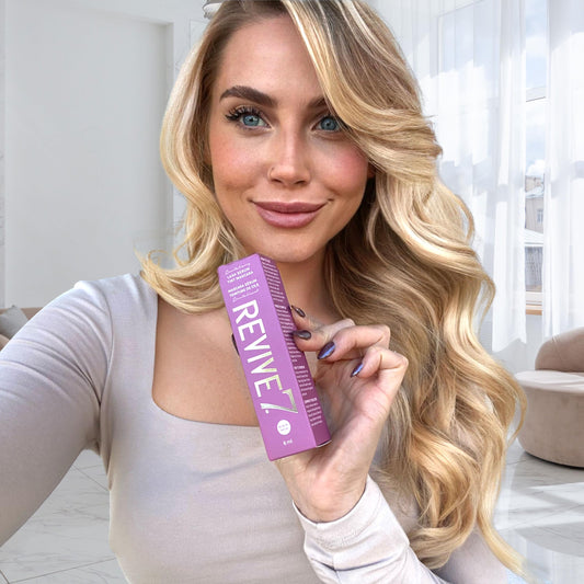 Revive7 Lash Serum Tint Mascara brush glide-on lashes for smooth, clump-free volume.