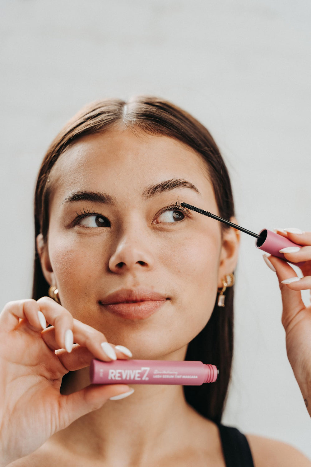Revive7 Lash Serum Tint Mascara long lashes appearance on eyes demonstrates visible length and thickness.
