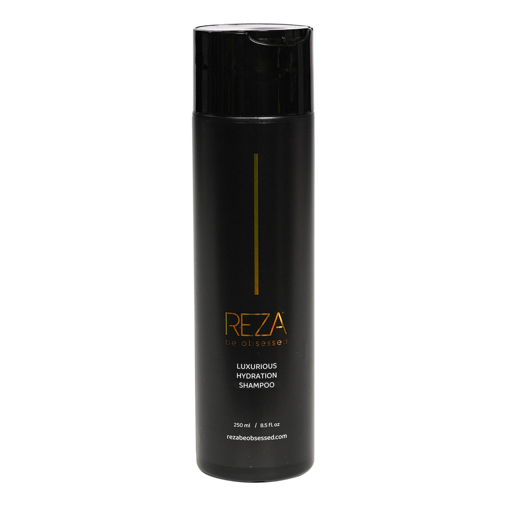 Reza Fixation Shampoo bottle highlights luxe formula for frizz control and shine.