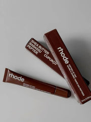 Rhode Gloss Lip Tint application delivering hydrated, sheer color.